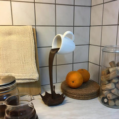 Floating Spilling Coffee Cup Sculpture